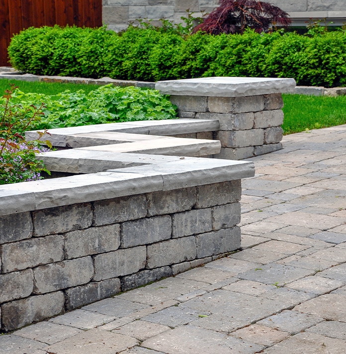 a statue of a cement bench